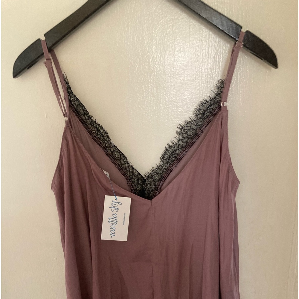New with tag light eggplant colored camisole with black lace